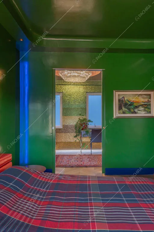 Camera da letto dell'appartamento Gila, location in stile contemporaneo a Roma