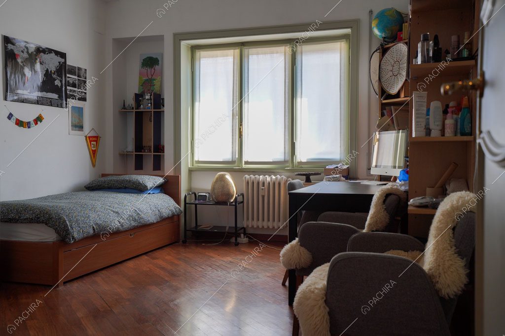 Camera da letto dell'appartamento Volga, location in stile moderno a Roma