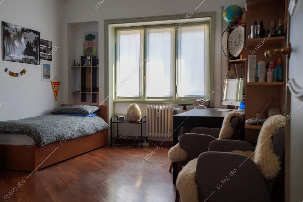 Camera da letto dell'appartamento Volga, location in stile moderno a Roma