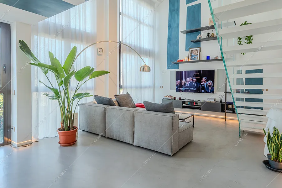 Zona living del loft Calluna, location in stile contemporaneo a Milano