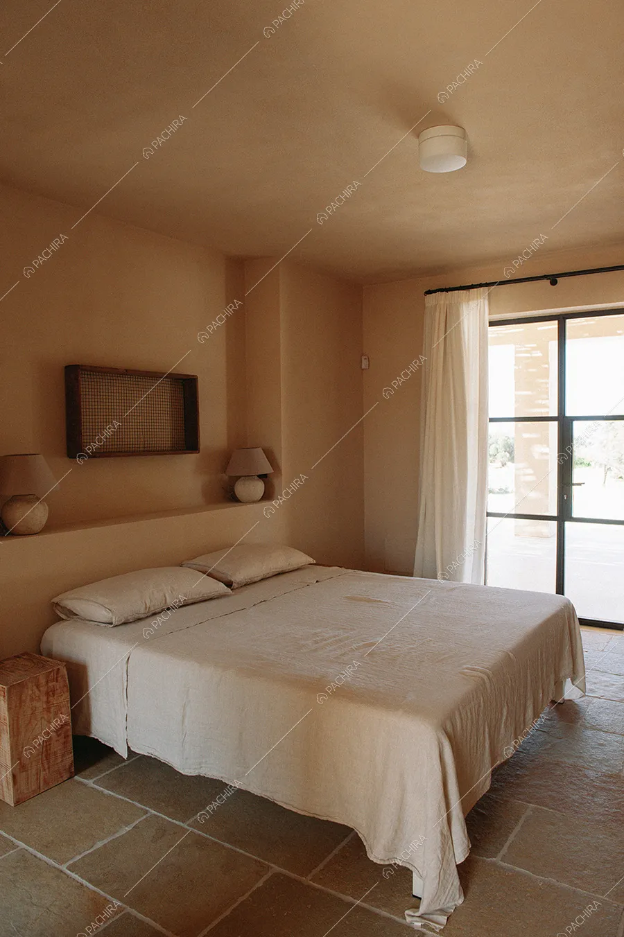 Camera da letto della villa Malacca, location in stile contemporaneo a Brindisi