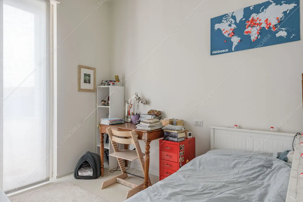 Camera da letto dell'appartamento Papagayo, location in stile contemporaneo a Milano