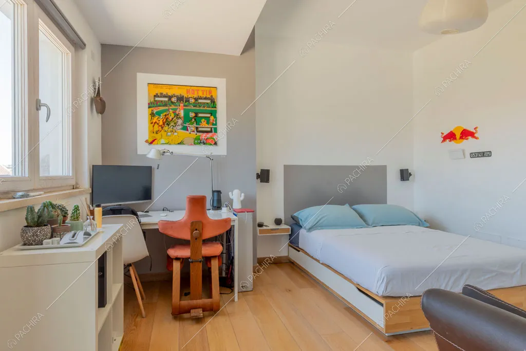 Pavimento in parquet nella camera da letto della villa Arafura, location in stile contemporaneo a Roma