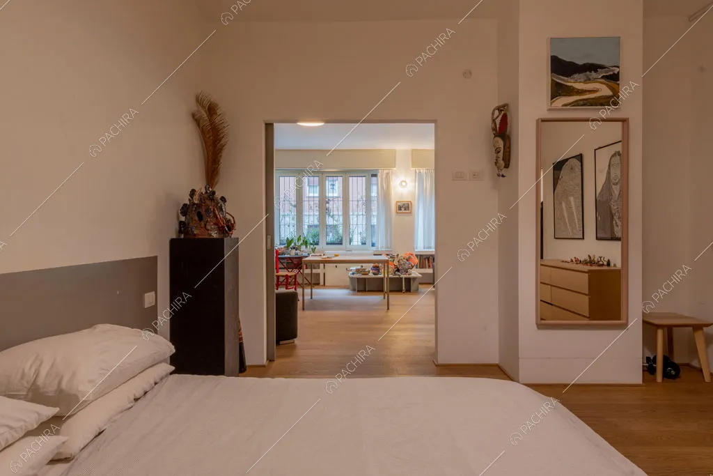 Camera da letto dell'appartamento Mungo, location in stile contemporaneo a Milano