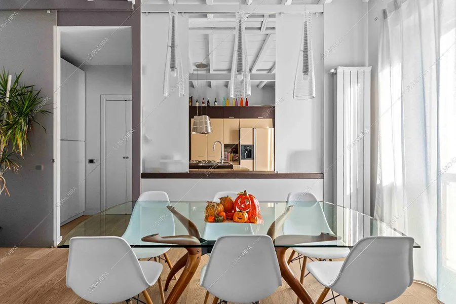 Sala da pranzo dell'appartamento Hood, location in stile moderno a Milano