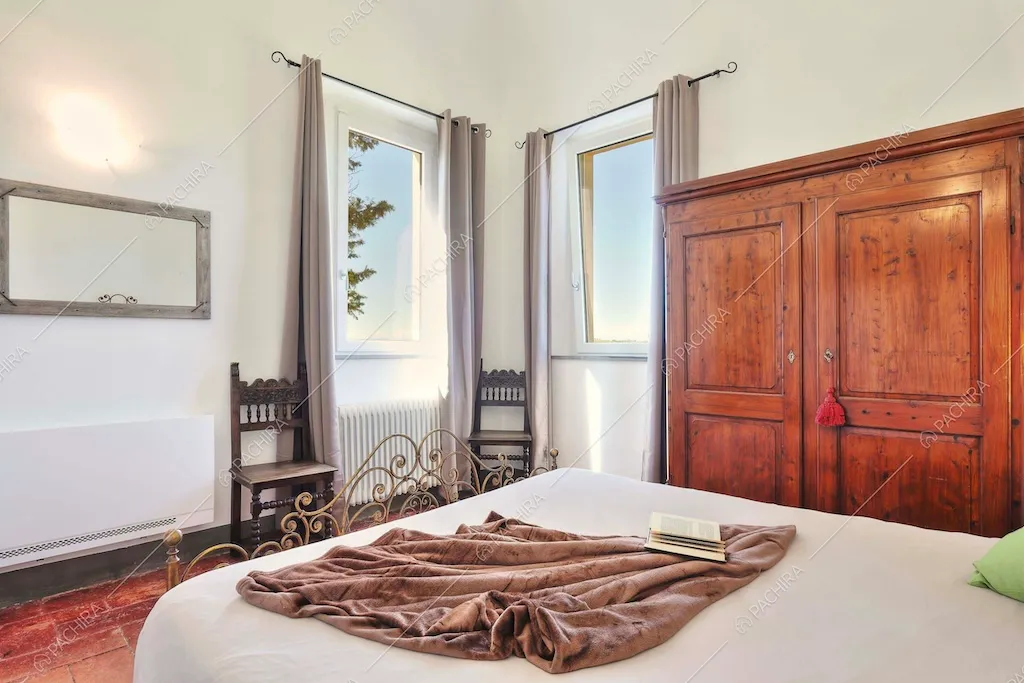 Camera da letto della dimora storica Denali, location in stile classico a Pisa