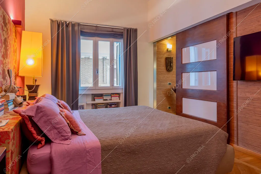 Camera da letto dell'appartamento Yalu, location in stile contemporaneo a Roma