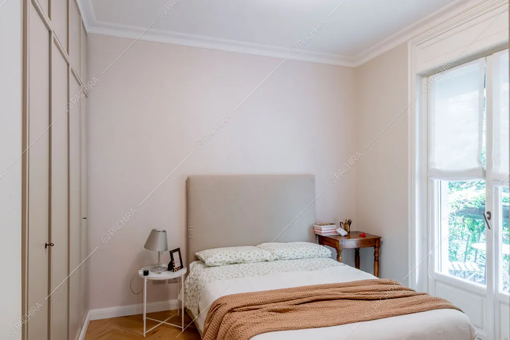 Camera da letto dell'appartamento Capsico, location in stile contemporaneo a Milano