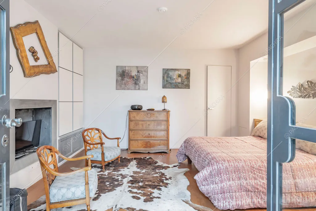 Camera da letto matrimoniale dell'appartamento Catalpa, location in stile moderno a Roma