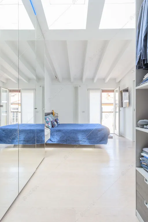 Camera da letto dell'appartamento Quiabo, location in stile contemporaneo a Milano