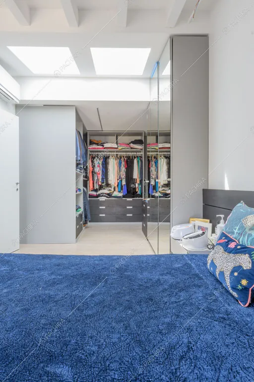 Camera da letto dell'appartamento Quiabo, location in stile contemporaneo a Milano