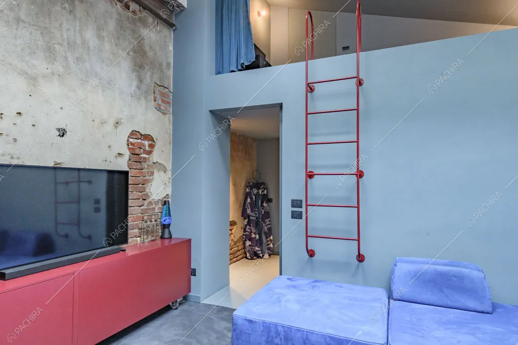 Camera da letto del loft Unakite, location in stile moderno a Milano