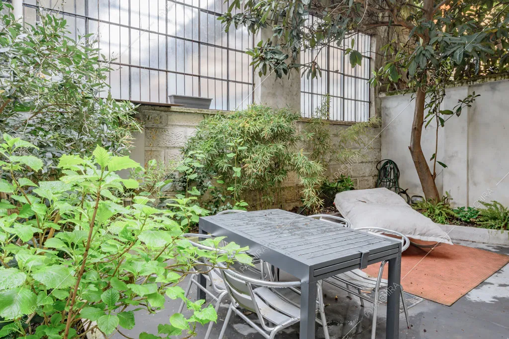 Giardino del loft Unakite, location in stile moderno a Milano