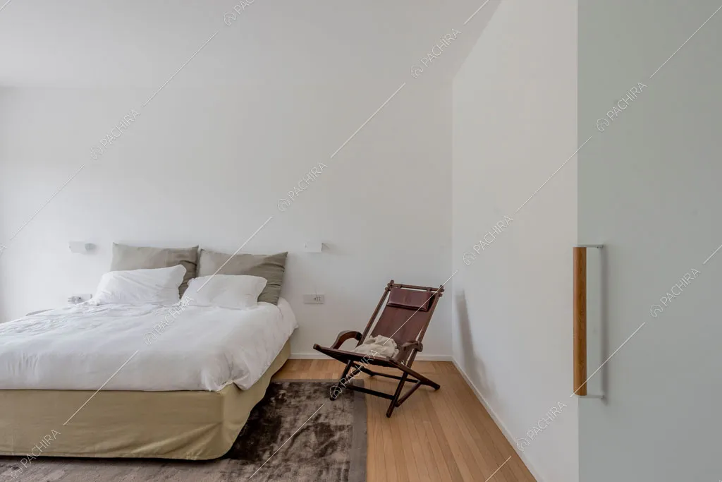 Camera da letto del loft Tigri, location in stile contemporaneo a Milano