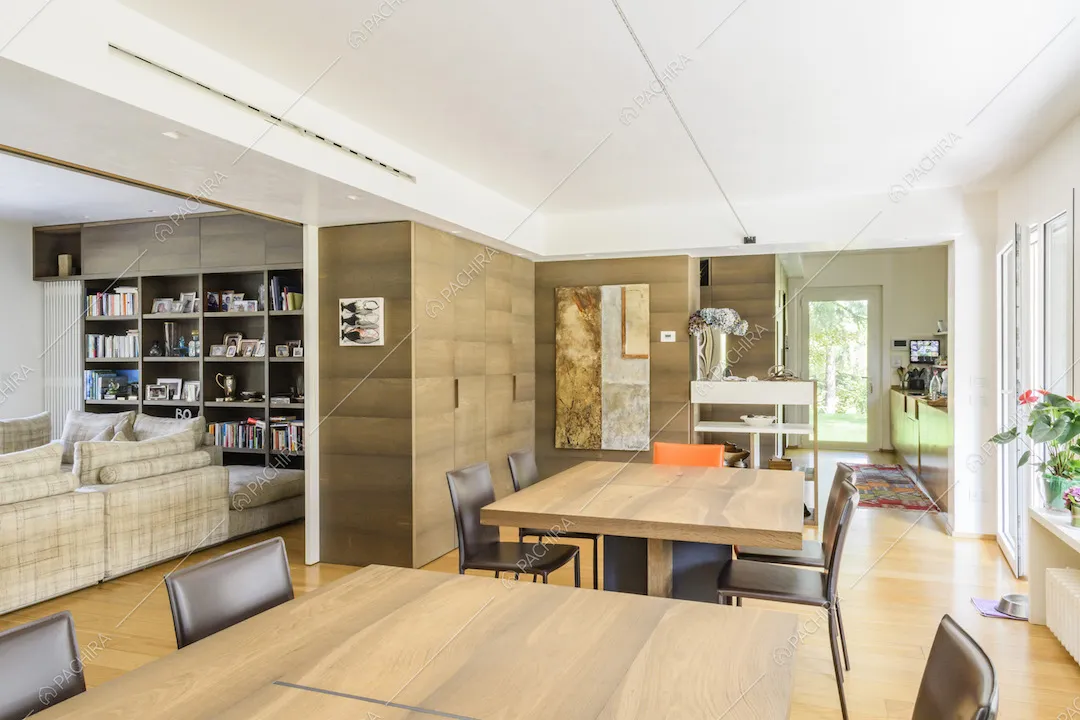 Open space con soggiorno, zona pranzo e cucina