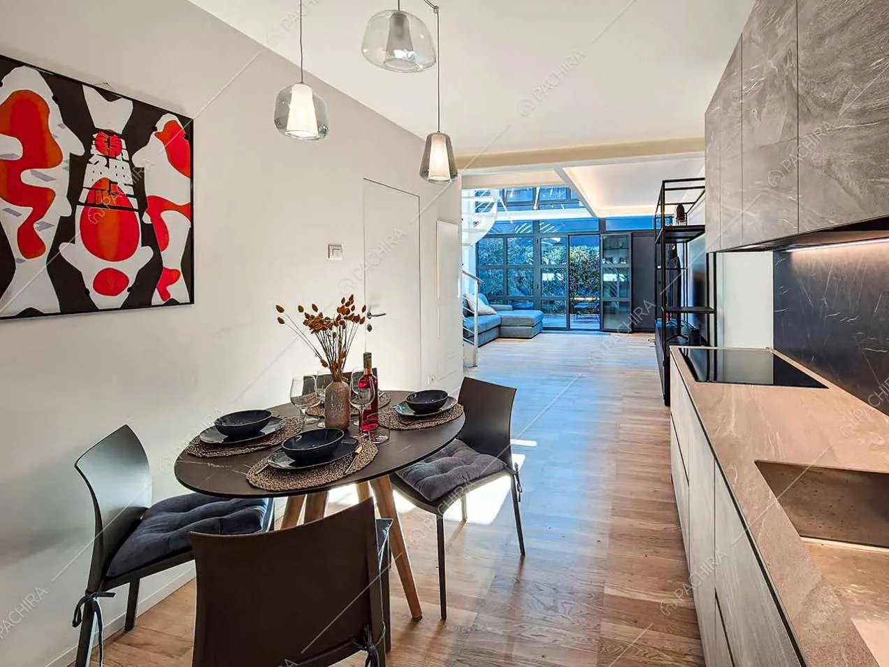 Cucina a vista della location Drina, loft in stile moderno a Milano