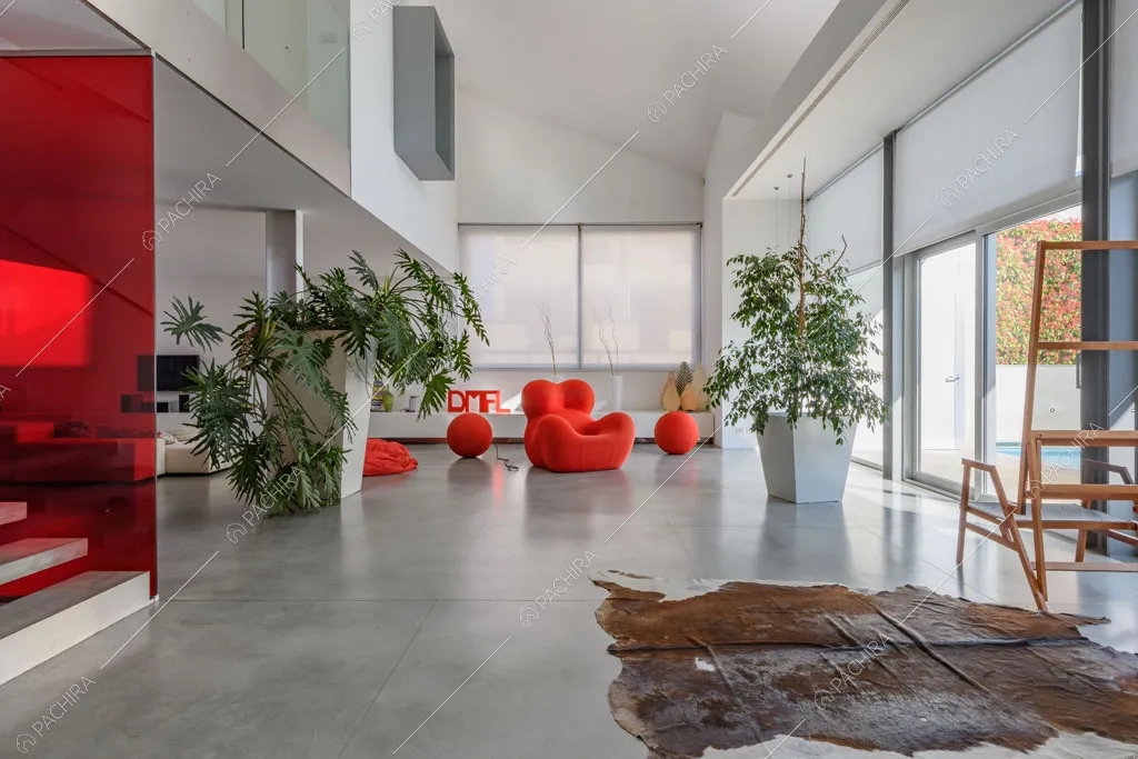 Zona living del loft Inula, location in stile contemporaneo a Varese