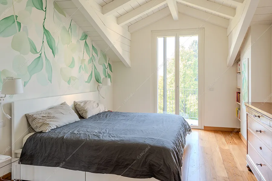 Camera da letto della villa Litani, location in stile moderno a Monza