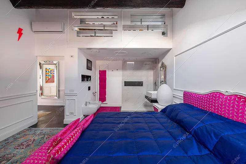 Camera da letto dell'appartamento Amazon, location in stile moderno a Novara