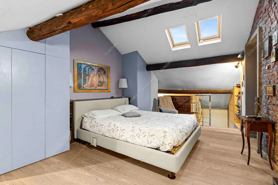 Camera da letto dell'appartamento Hood, location in stile moderno a Milano