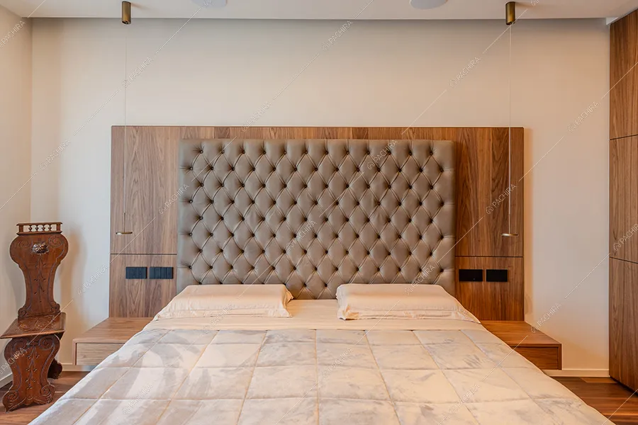 Camera da letto della location Ebano, attico in stile classico a Milano