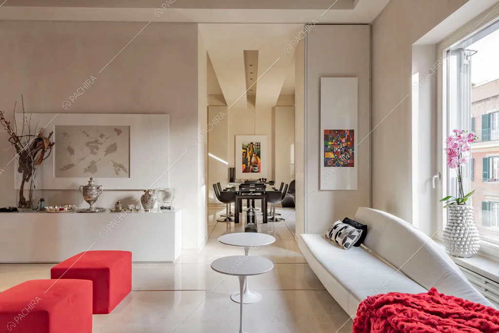 Luminosa zona living dell'appartamento Kamala, location in stile contemporaneo a Roma