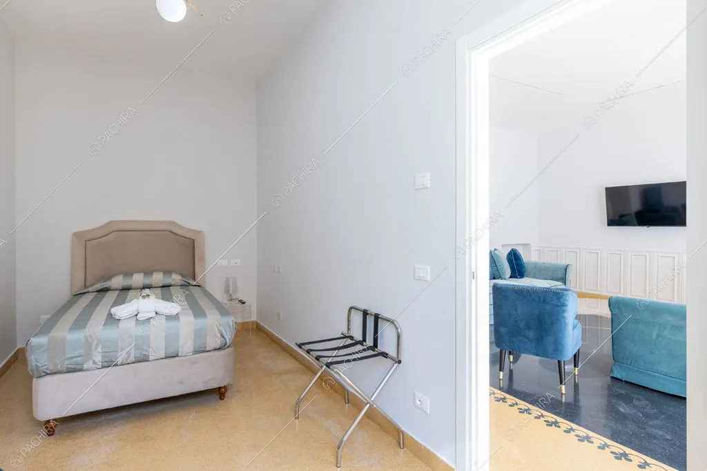 Camera da letto dell'appartamento Ural, location in stile moderno a Roma
