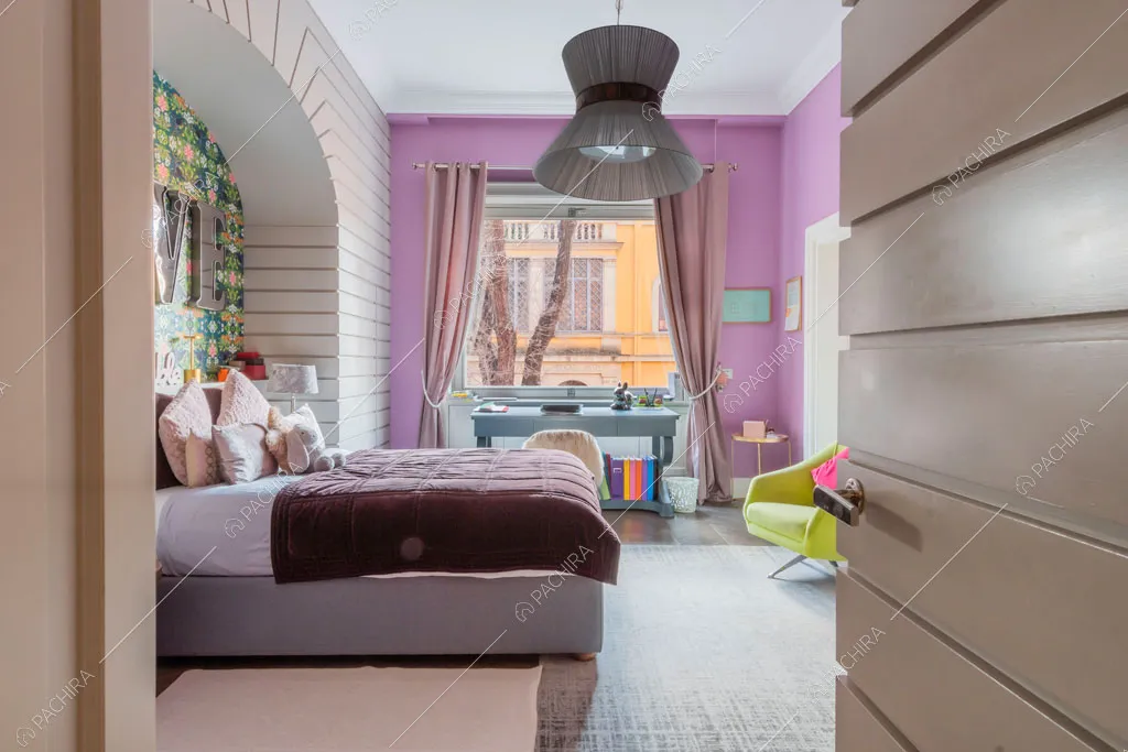 Camera da letto della villa Espero, location in stile contemporaneo a Roma