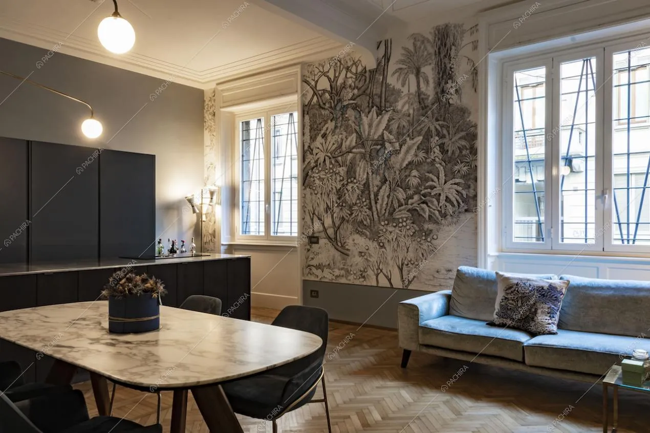 Cucina a vista con pavimento in parquet