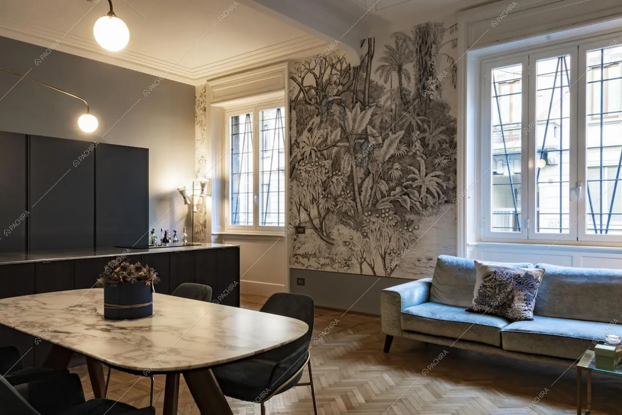 Cucina a vista con pavimento in parquet