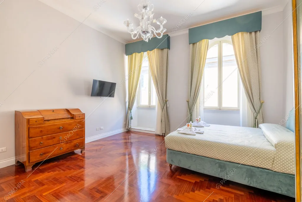 Camera da letto dell'appartamento Ural, location in stile moderno a Roma