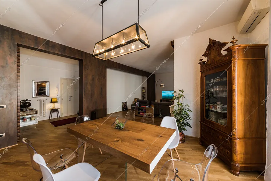 Zona pranzo dell'appartamento Araguaia, location in stile moderno a Roma