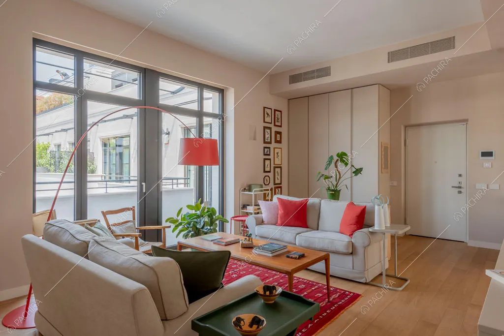 Zona living dell'appartamento Foehn, location in stile contemporaneo a Milano