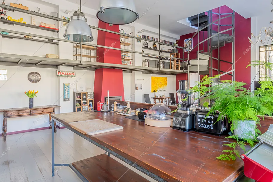 Zona living del loft Piave, location in stile moderno a Milano