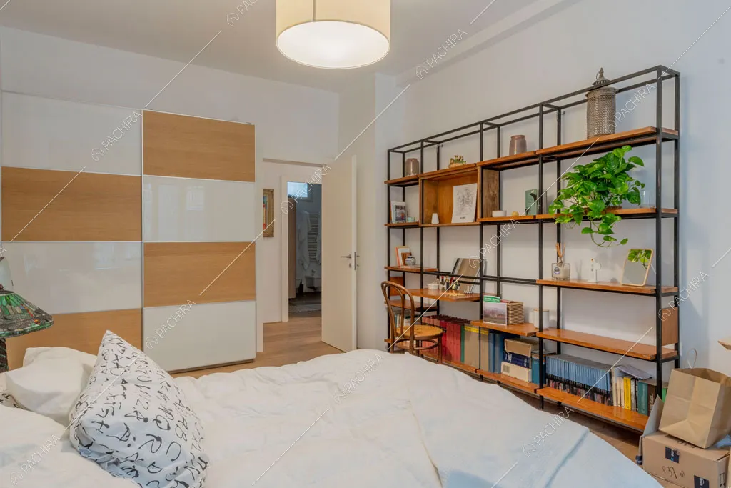 Camera da letto dell'appartamento Mungo, location in stile contemporaneo a Milano