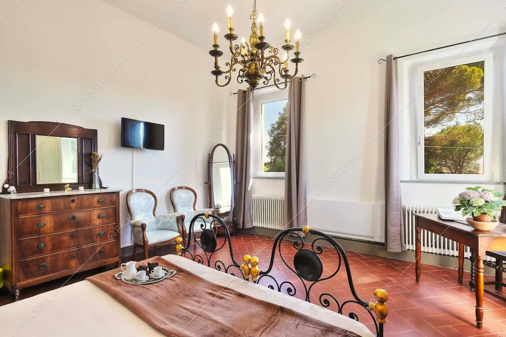 Camera da letto della dimora storica Denali, location in stile classico a Pisa