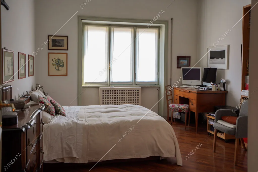 Camera da letto dell'appartamento Volga, location in stile moderno a Roma