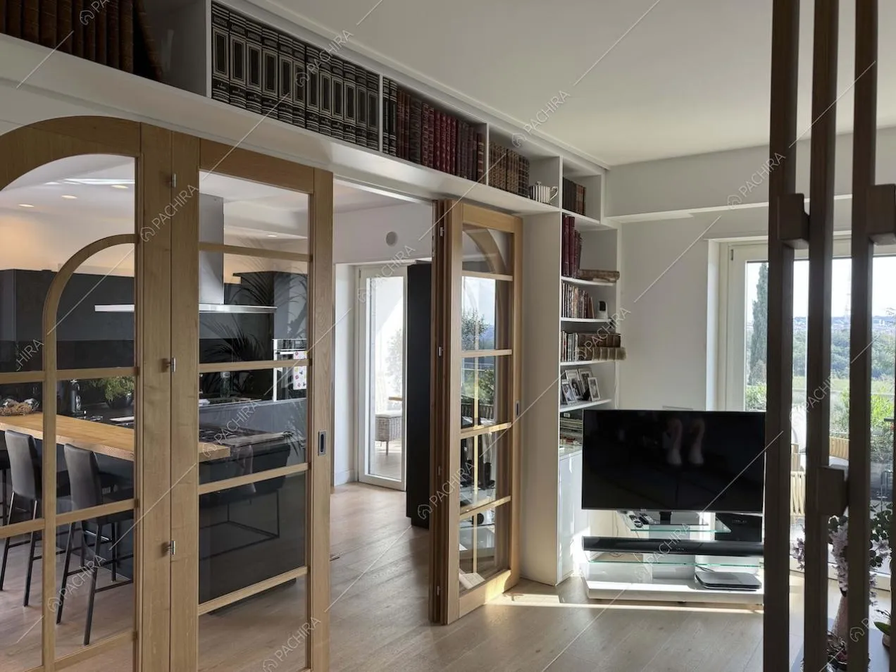 Zona living dell'appartamento Gesso, location in stile contemporaneo a Roma