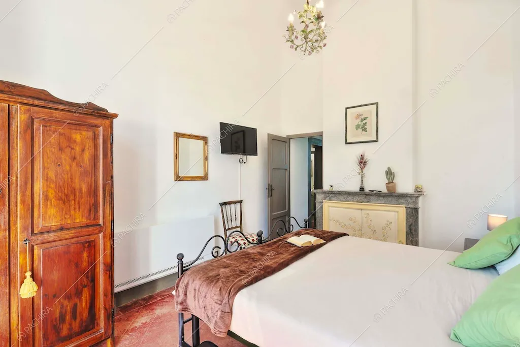 Camera da letto matrimoniale della dimora storica Denali, location in stile classico a Pisa
