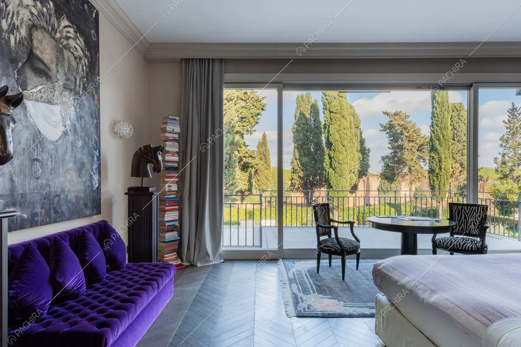 Camera da letto della villa Espero, location in stile contemporaneo a Roma