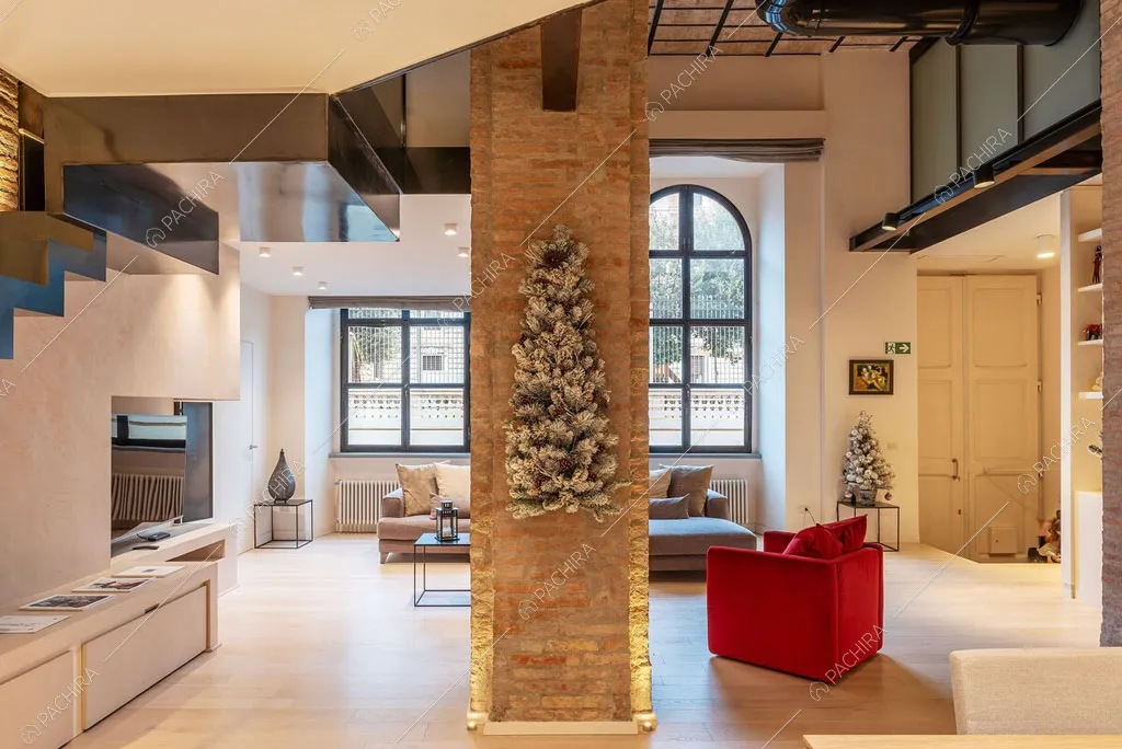 Luminosa sala del loft Sabbia, location in stile moderno a Roma