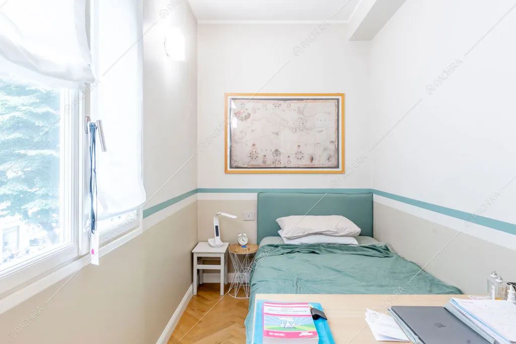 Camera da letto dell'appartamento Capsico, location in stile contemporaneo a Milano