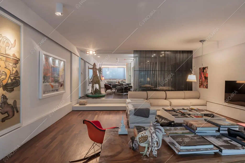 Zona living con pavimento in parquet dell'appartamento Carpentaria, location in stile contemporaneo a Roma