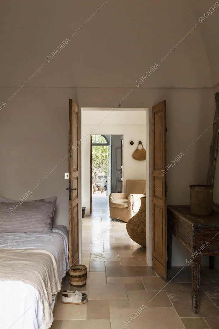 Camera da letto della masseria Giava, location in stile rustico a Brindisi