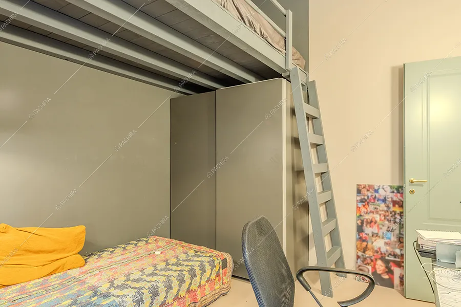 Camera da letto dell'appartamento Buganvilla, location in stile moderno a Milano
