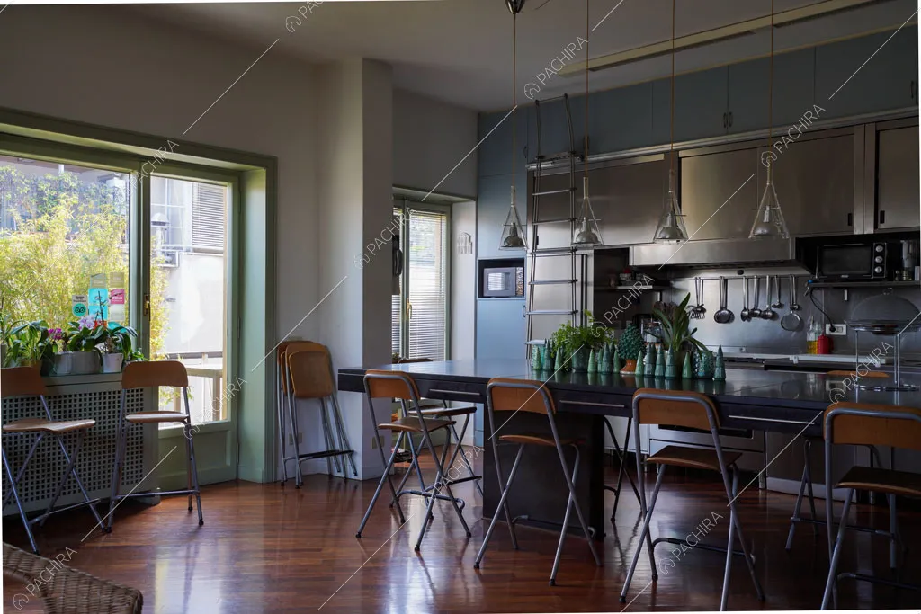 Cucina a vista dell'appartamento Volga, location in stile moderno a Roma