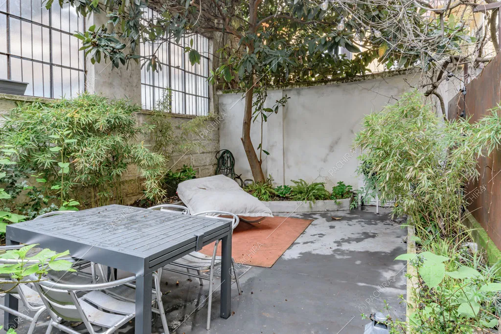 Giardino del loft Unakite, location in stile moderno a Milano