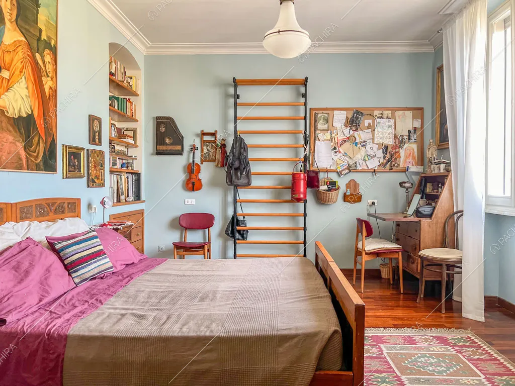 Camera da letto dell'appartamento Kuban, location in stile moderno a Roma