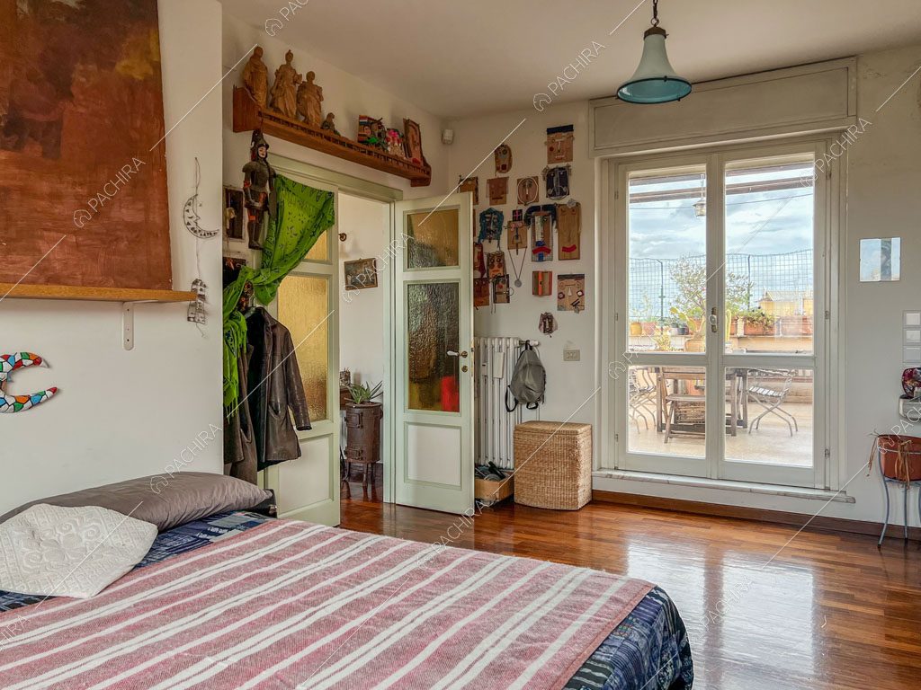 Camera da letto dell'appartamento Kuban, location in stile moderno a Roma