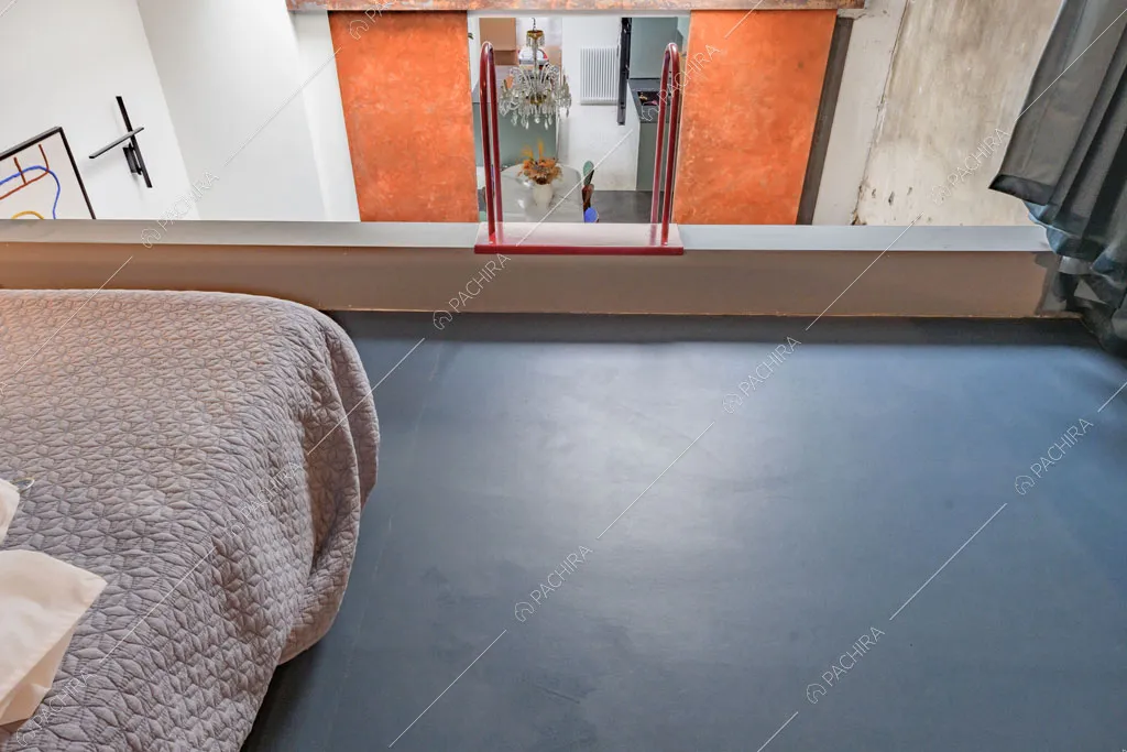 Camera da letto del loft Unakite, location in stile moderno a Milano